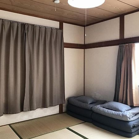 Golden Mile Apartment Amami Buitenkant foto
