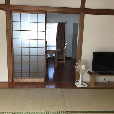 Golden Mile Apartment Amami Buitenkant foto