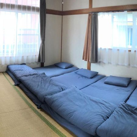 Golden Mile Apartment Amami Buitenkant foto