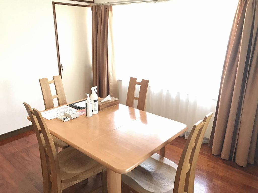 Golden Mile Apartment Amami Buitenkant foto