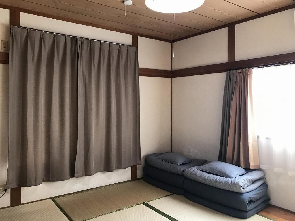 Golden Mile Apartment Amami Buitenkant foto