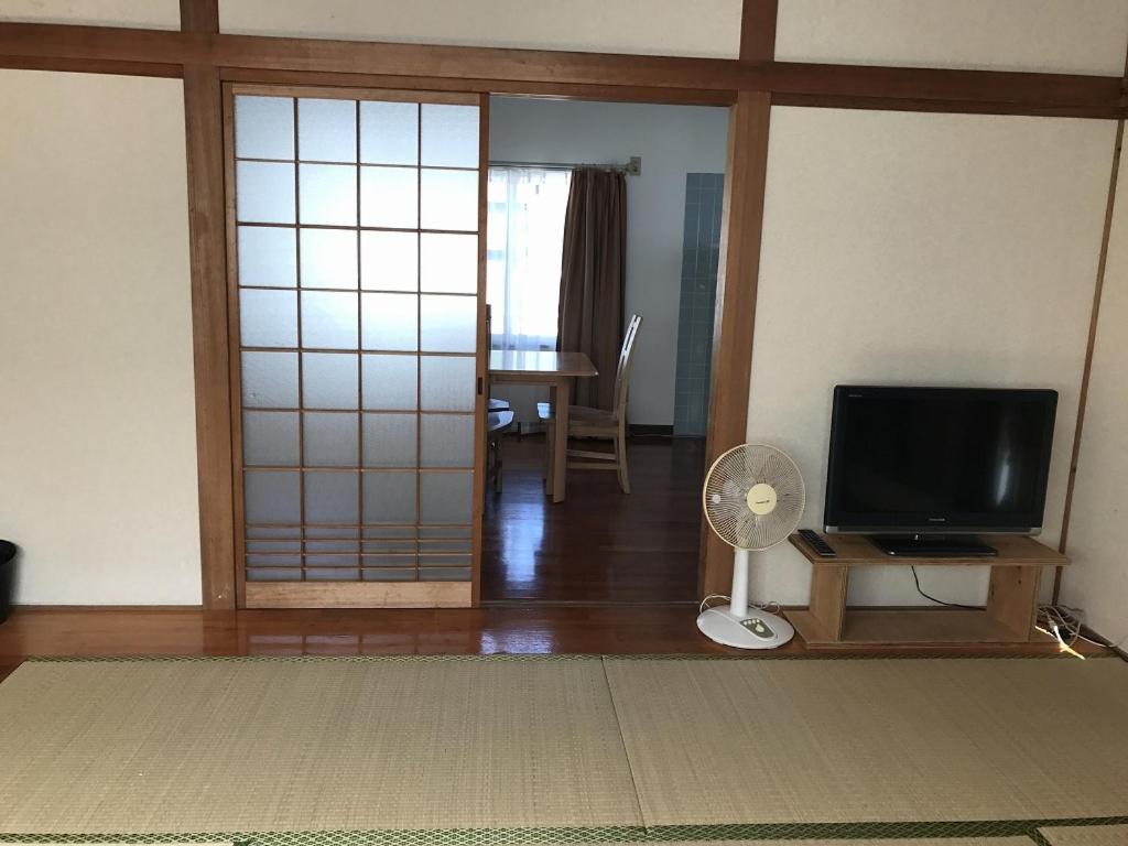 Golden Mile Apartment Amami Buitenkant foto
