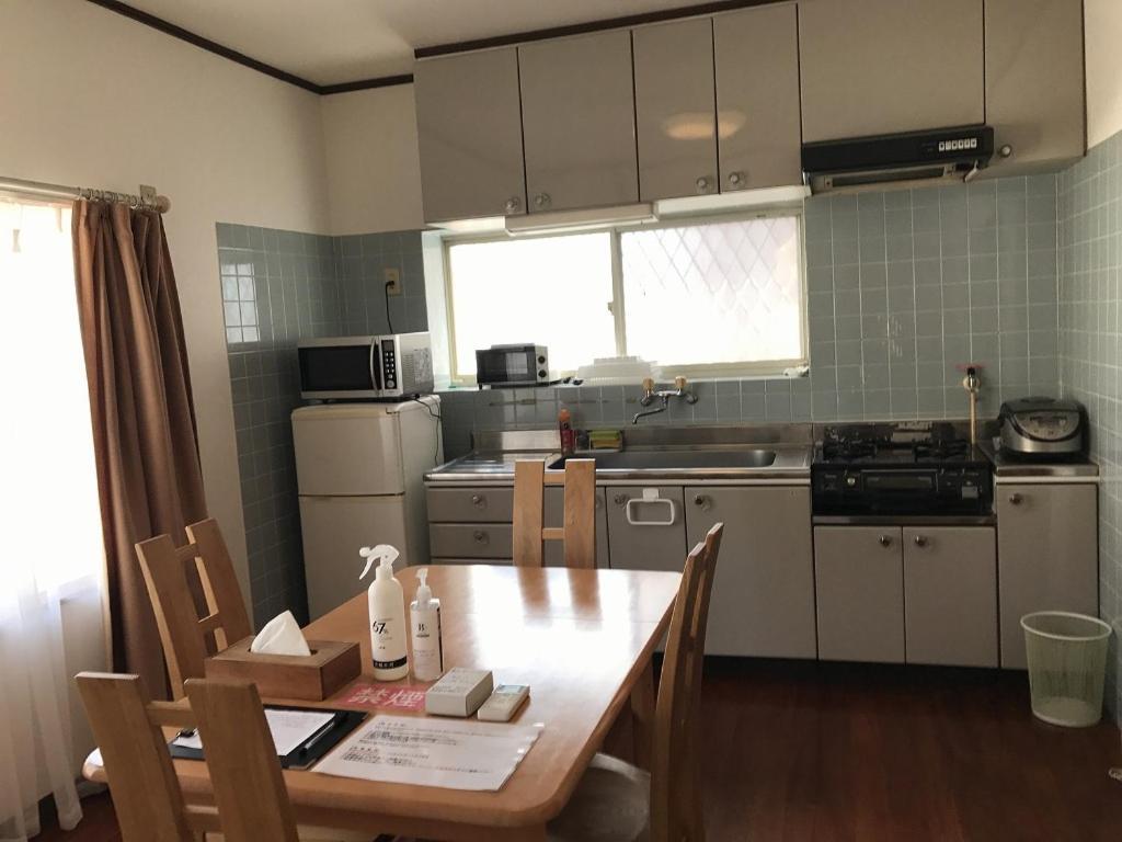 Golden Mile Apartment Amami Buitenkant foto