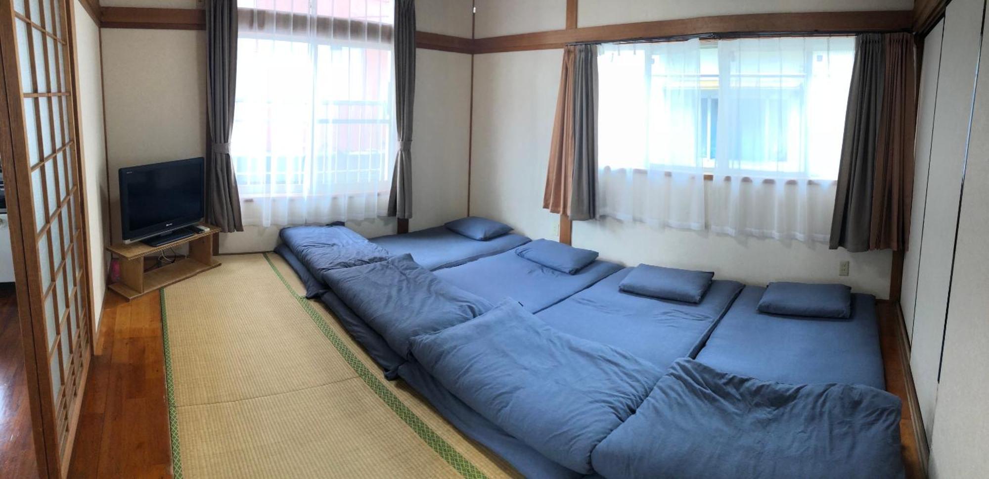 Golden Mile Apartment Amami Buitenkant foto